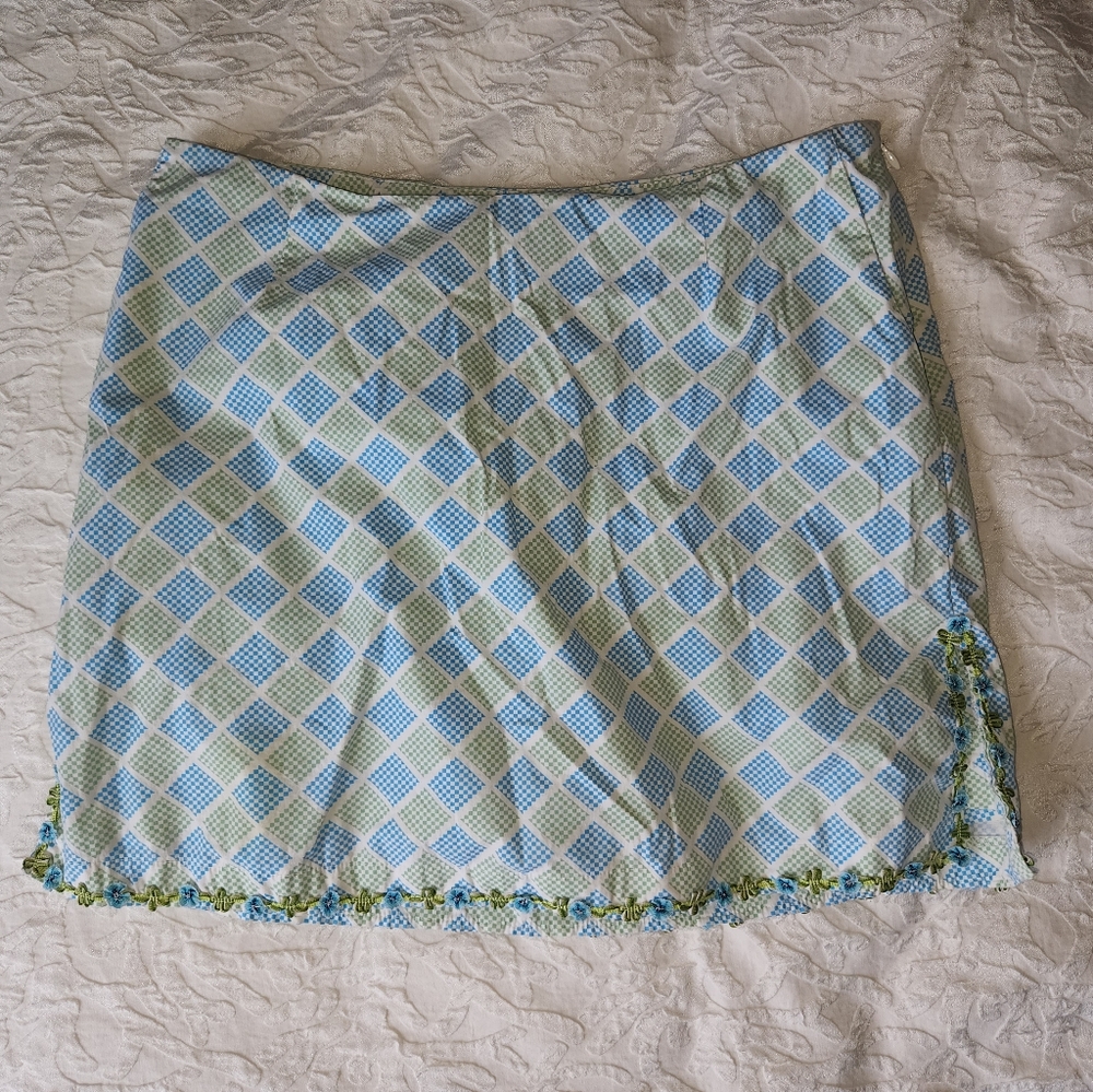 Golftini Women’s Skort Green Blue white Floral embellishments on hems Size 10.